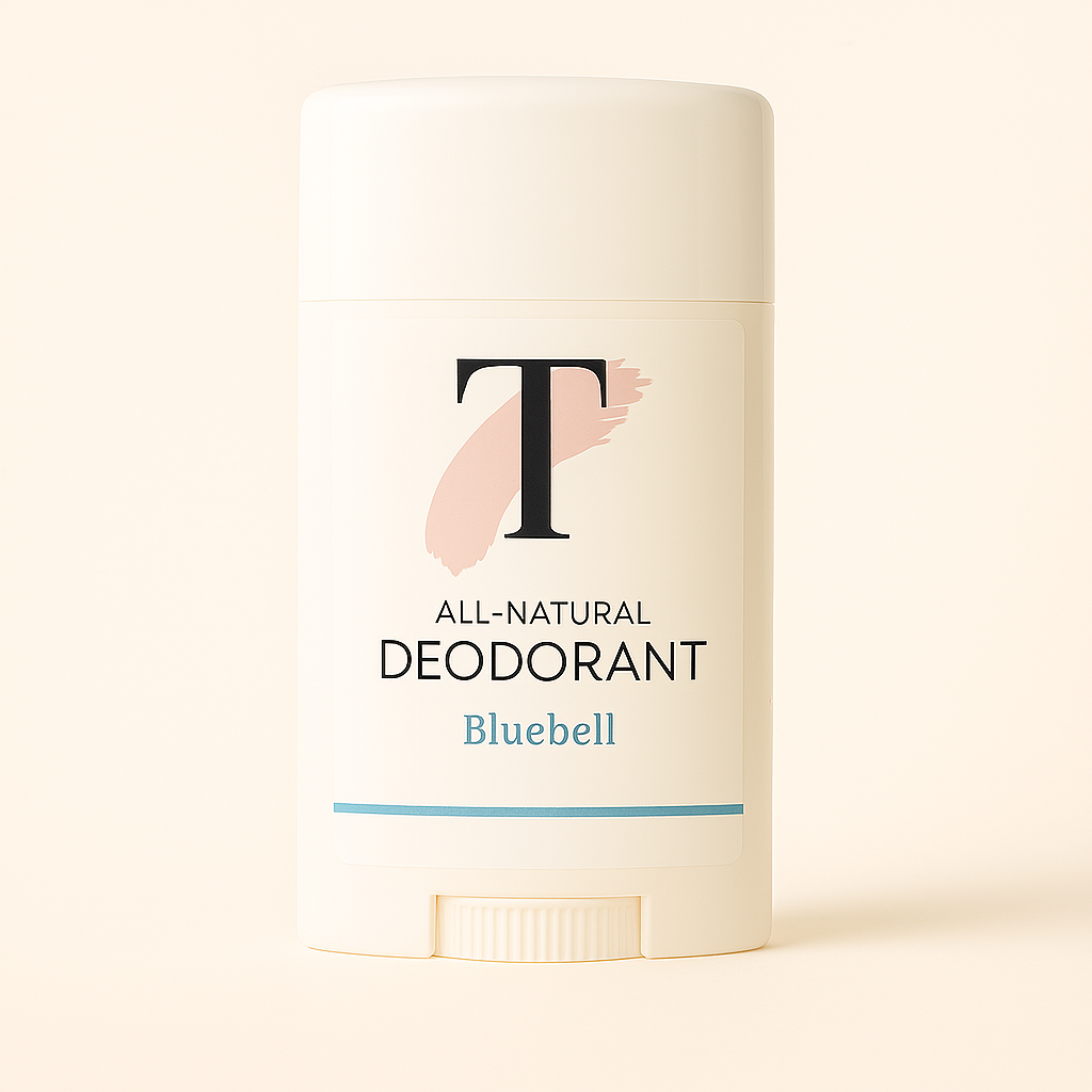 Person reaching for a deodorant stick on a bathroom counter.